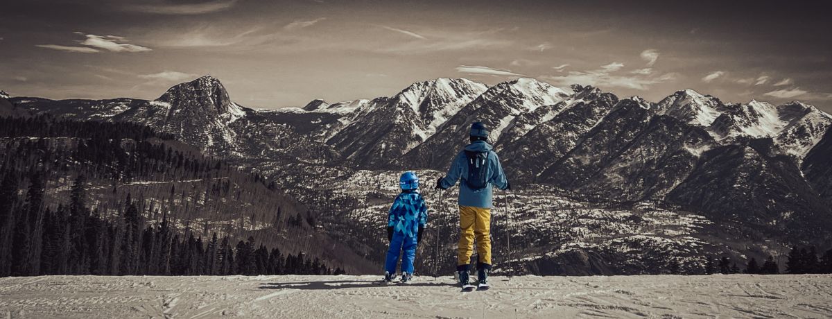 Two Skiers atop the summit